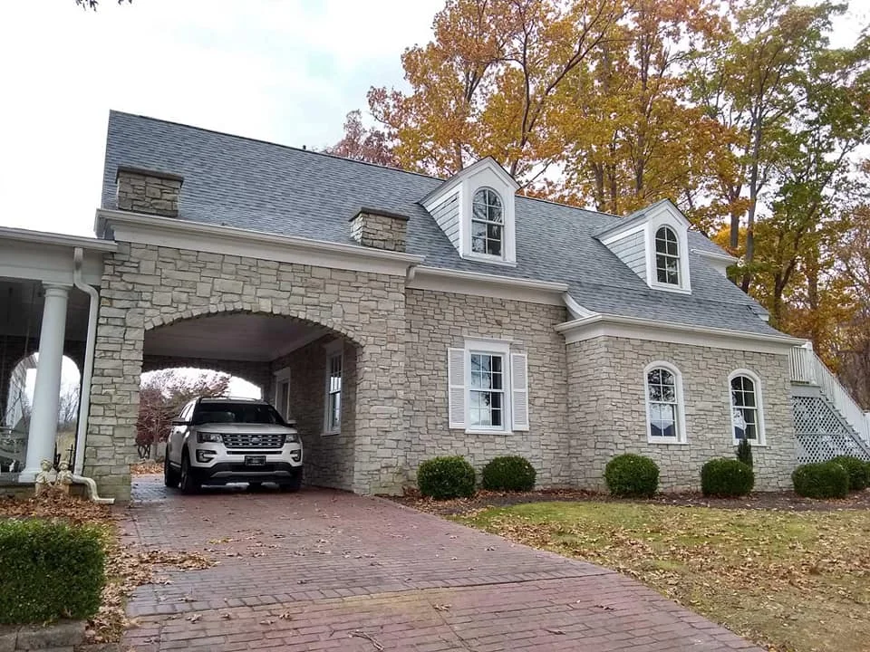 A beautifully renovated stone house with a new roof