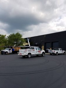 Company trucks at work site