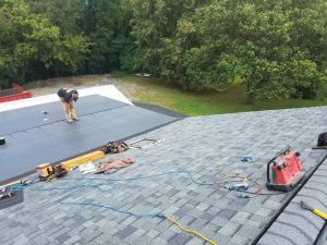 Man working on roof